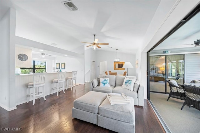 1610 Sabal Sands Rd, Sanibel, FL 33957 - living area with lofted ceiling, wood finished floors, visible vents, a ceiling fan, and baseboards