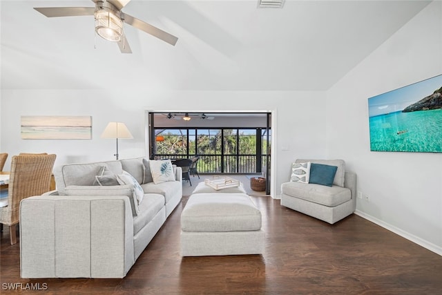 living room with lofted ceiling, ceiling fan, and dark hardwood / wood-style floors