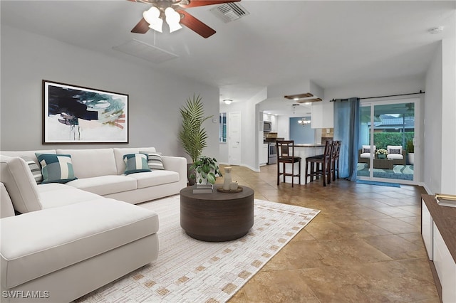 living room featuring ceiling fan