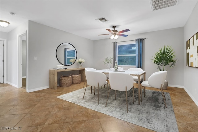 dining area with ceiling fan