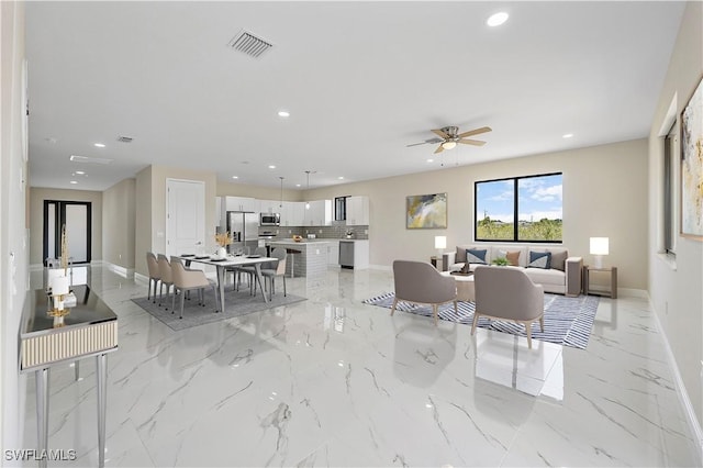 516 Kilarney Ave S, Lehigh Acres, FL 33974 - living room featuring baseboards, a ceiling fan, recessed lighting, and visible vents