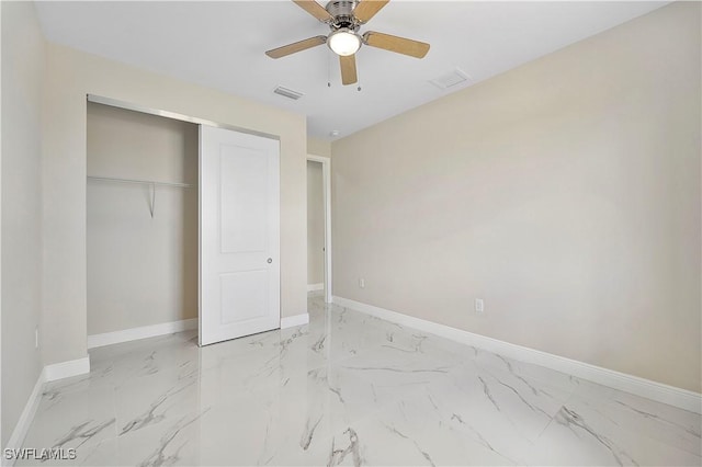 516 Kilarney Ave S, Lehigh Acres, FL 33974 - unfurnished bedroom featuring baseboards, visible vents, and marble finish floor