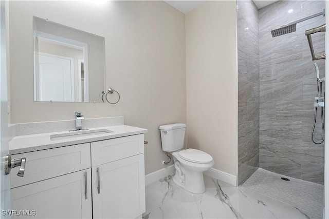 516 Kilarney Ave S, Lehigh Acres, FL 33974 - bathroom with vanity, marble finish floor, toilet, baseboards, and a tile shower