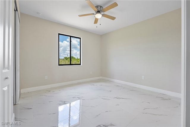 unfurnished room featuring ceiling fan