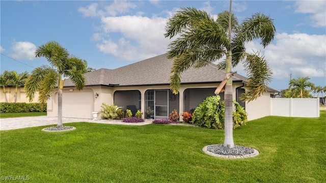 1013 SW 4th Pl, Cape Coral, FL 33991 - view of front of property featuring stucco siding, driveway, a garage, and roof with shingles