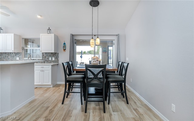 dining area featuring light wood-type flooring