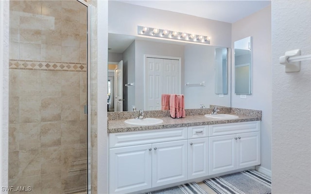 1013 SW 4th Pl, Cape Coral, FL 33991 - bathroom featuring a shower stall and double vanity