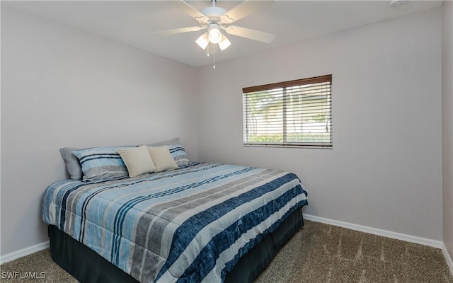 1013 SW 4th Pl, Cape Coral, FL 33991 - bedroom with carpet, baseboards, and ceiling fan