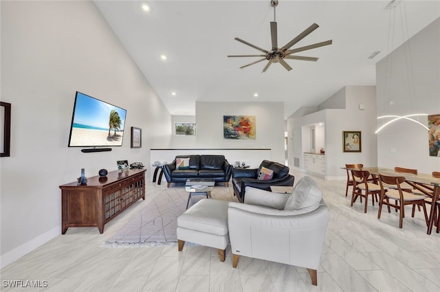 living room featuring ceiling fan, high vaulted ceiling, recessed lighting, visible vents, and baseboards