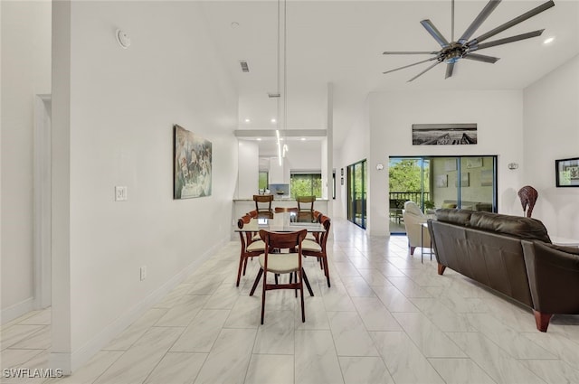 dining room with ceiling fan, recessed lighting, visible vents, and baseboards