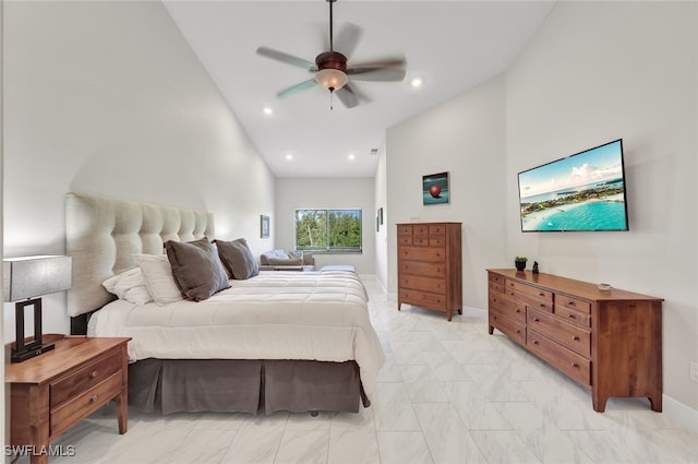 bedroom featuring ceiling fan, marble finish floor, lofted ceiling, and recessed lighting