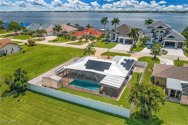 aerial view featuring a water view and a residential view