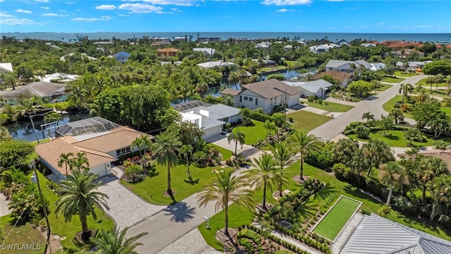 bird's eye view with a water view