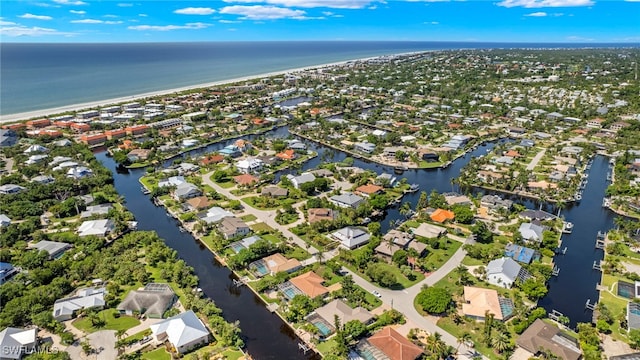 bird's eye view featuring a water view and a residential view
