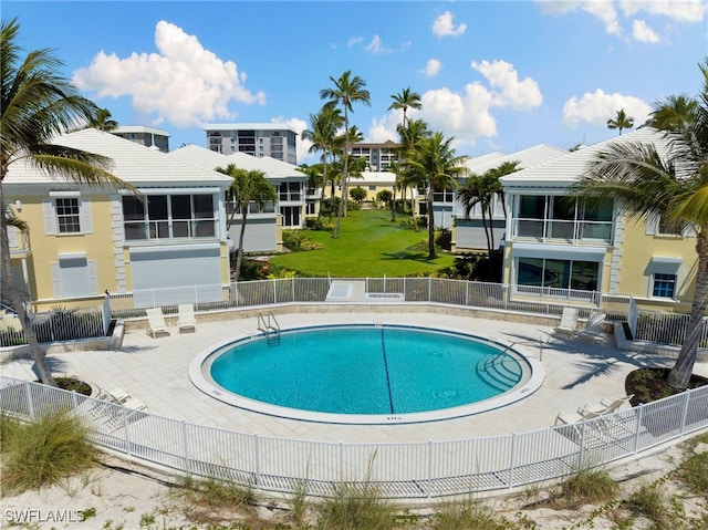 view of swimming pool featuring a patio area