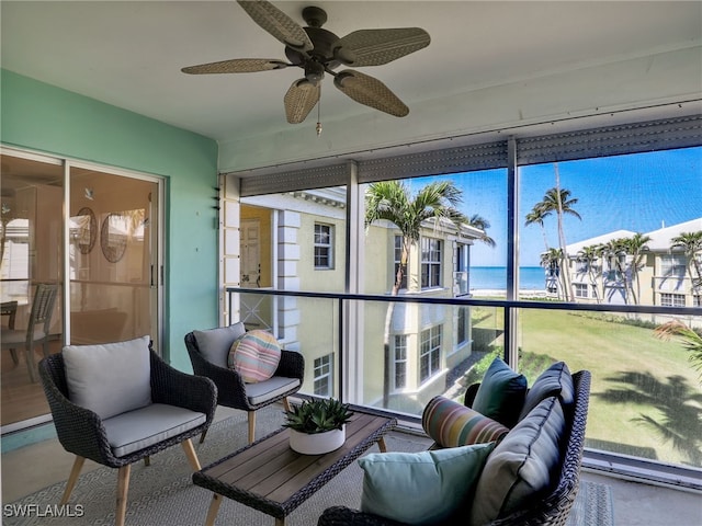 2601 Gulf Shore Blvd N Unit 34, Naples, FL 34103 - sunroom with ceiling fan and a water view