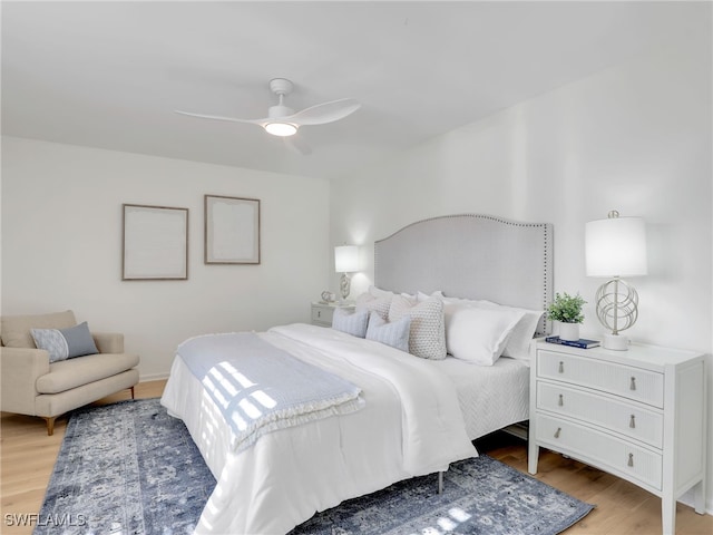 2601 Gulf Shore Blvd N Unit 34, Naples, FL 34103 - bedroom featuring light wood-style floors and a ceiling fan