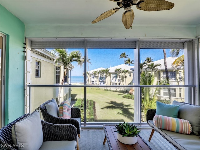 2601 Gulf Shore Blvd N Unit 34, Naples, FL 34103 - sunroom / solarium featuring a water view, ceiling fan, and healthy amount of natural light