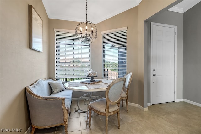 dining room featuring light tile patterned flooring, crown molding, and an inviting chandelier