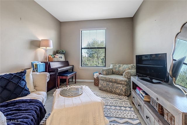 living room with light tile patterned flooring