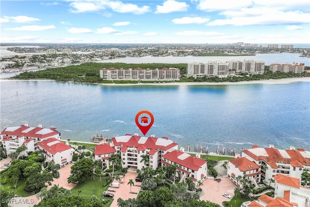 birds eye view of property featuring a water view