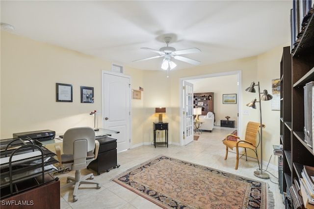 tiled home office with ceiling fan