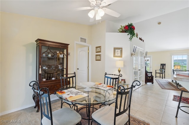 dining room featuring light tile patterned floors and ceiling fan