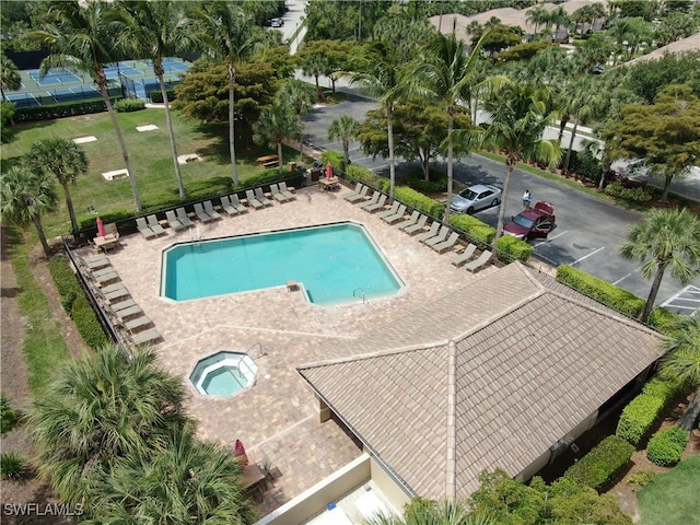 view of swimming pool with a patio