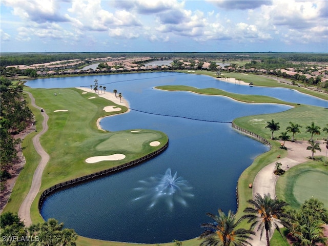 bird's eye view with a water view