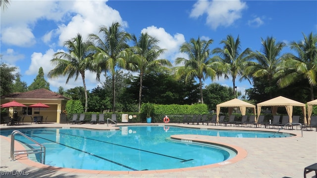 view of swimming pool featuring a gazebo and a patio area