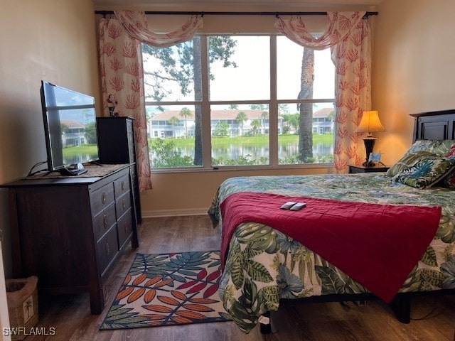 bedroom featuring hardwood / wood-style flooring