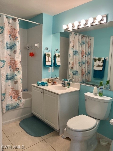 full bathroom with tile patterned flooring, vanity, toilet, and shower / bath combo