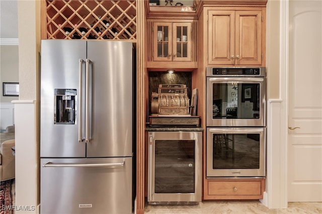 kitchen with light tile patterned floors, wine cooler, stainless steel appliances, and crown molding