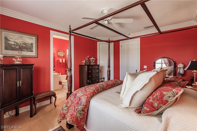 bedroom with ceiling fan, connected bathroom, and crown molding