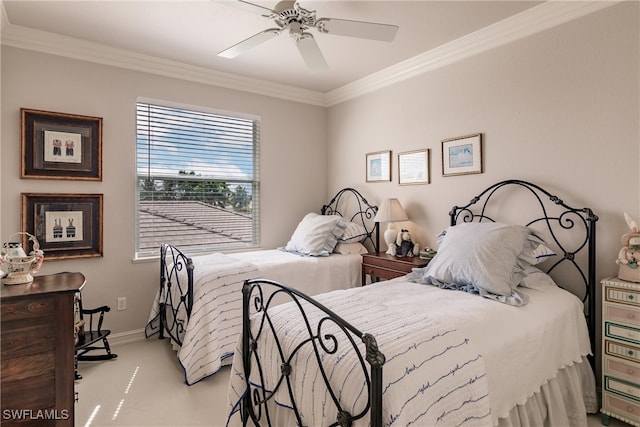 carpeted bedroom with ceiling fan and ornamental molding