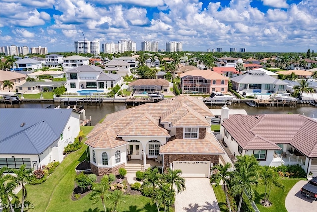 drone / aerial view with a water view