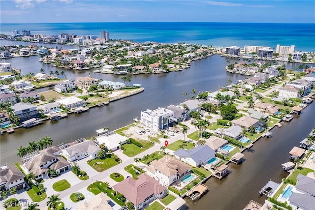 aerial view featuring a water view