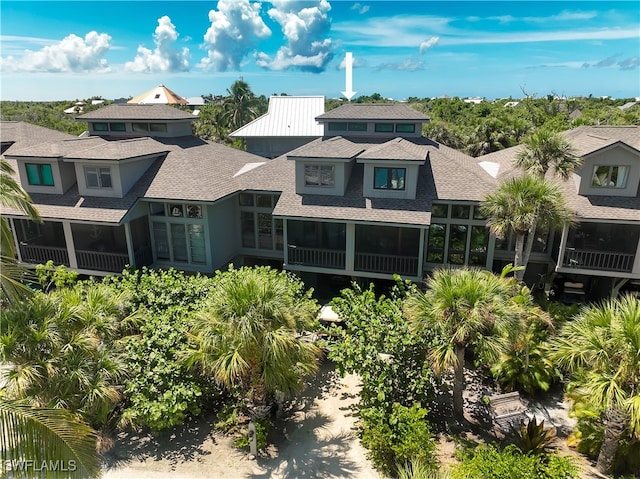 exterior space featuring a sunroom