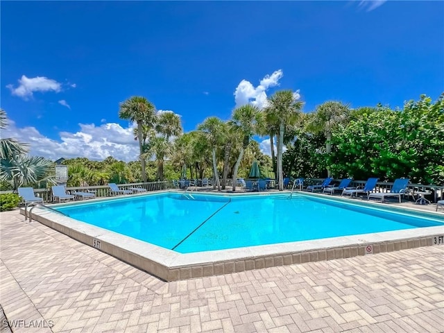 community pool featuring a patio