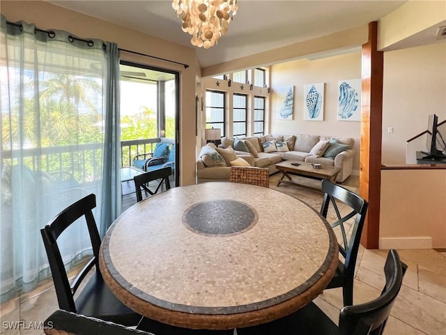 dining room featuring a chandelier