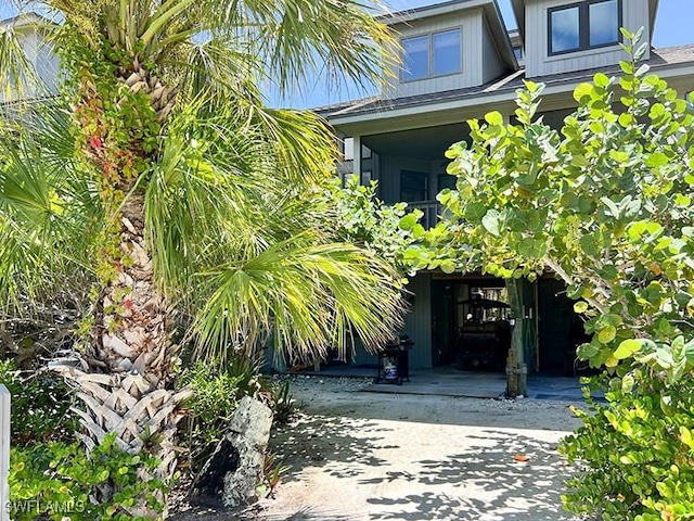 doorway to property featuring driveway