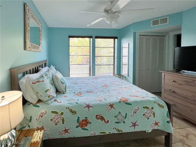 bedroom with a closet and a ceiling fan