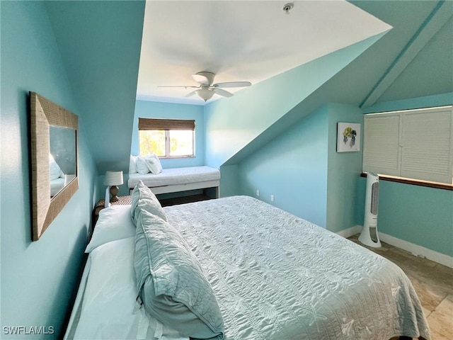 bedroom featuring ceiling fan and baseboards