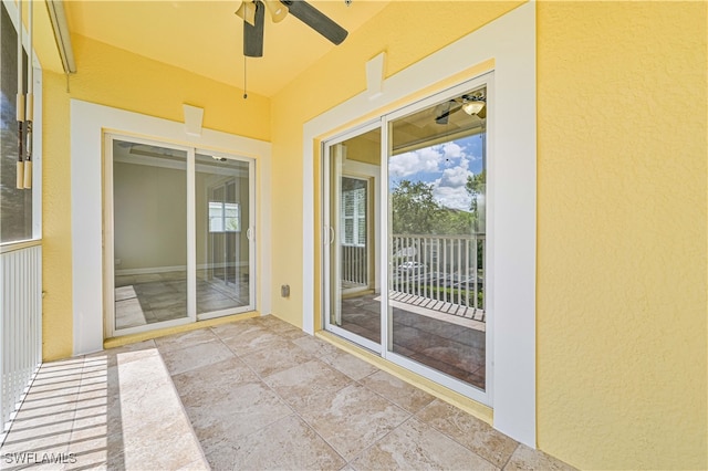 exterior space featuring ceiling fan