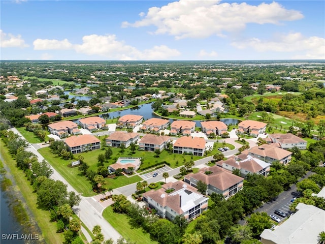 drone / aerial view with a water view