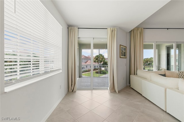 entryway featuring light tile patterned floors