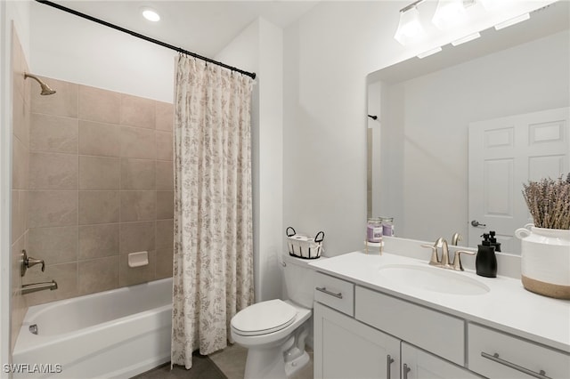 full bathroom with vanity, toilet, and shower / tub combo