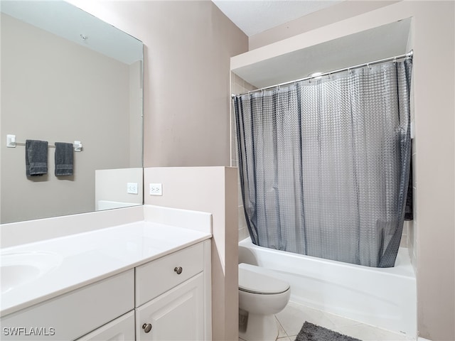 full bathroom with shower / tub combo with curtain, vanity, toilet, and tile patterned floors