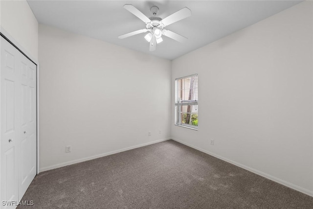 unfurnished bedroom featuring a ceiling fan, a closet, baseboards, and carpet flooring