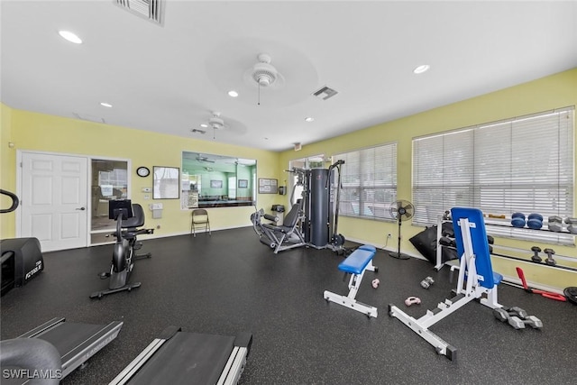 workout area featuring recessed lighting, visible vents, and baseboards